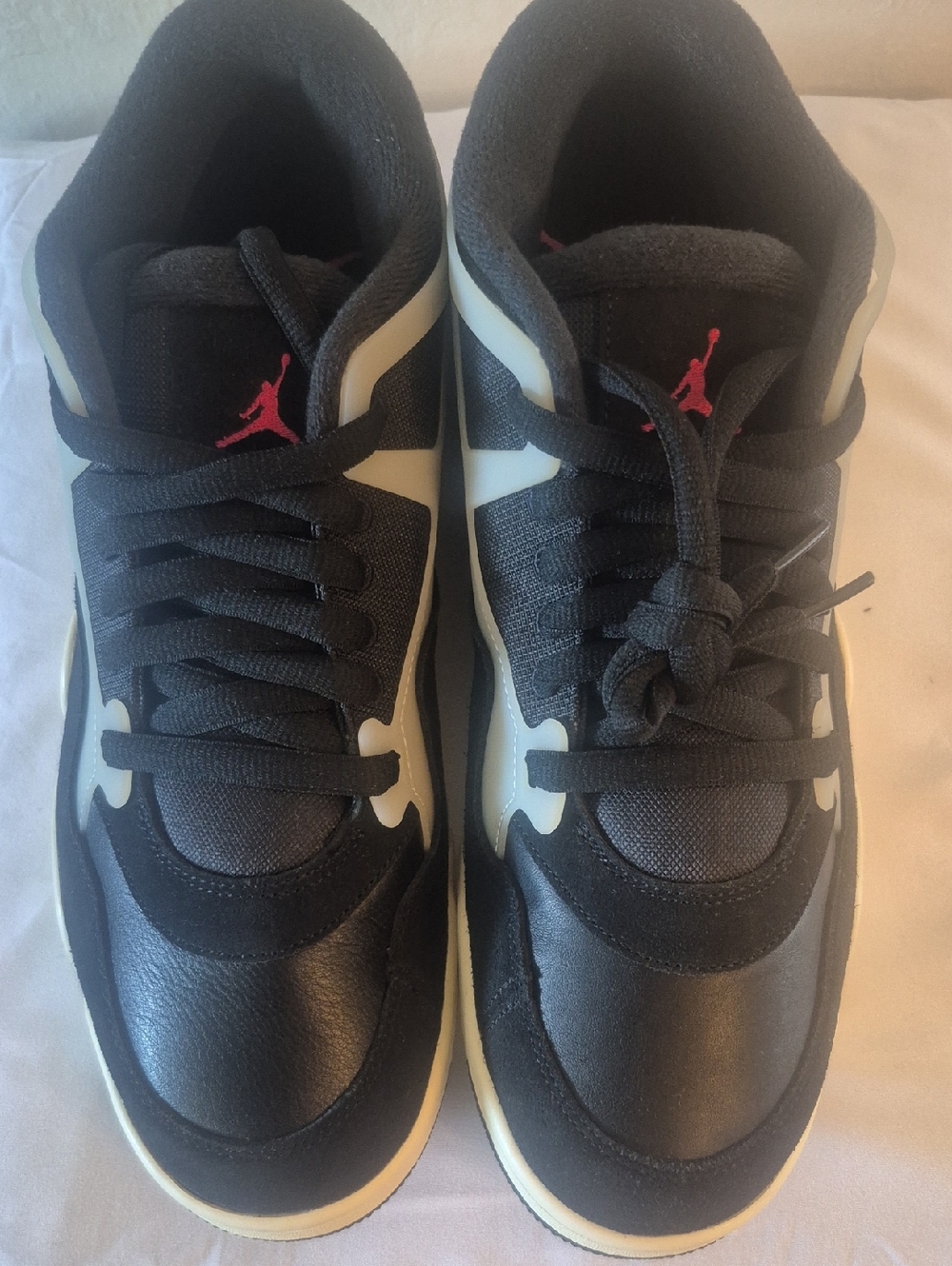 Nike Black and White Athletic Sneakers with Pink Logo